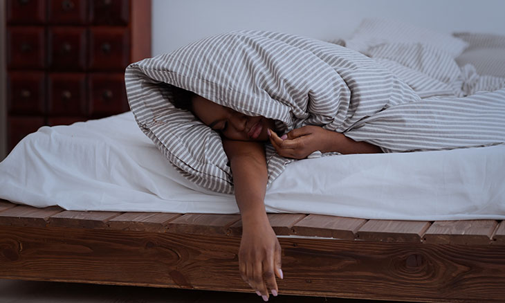 Woman having trouble getting a good night's sleep