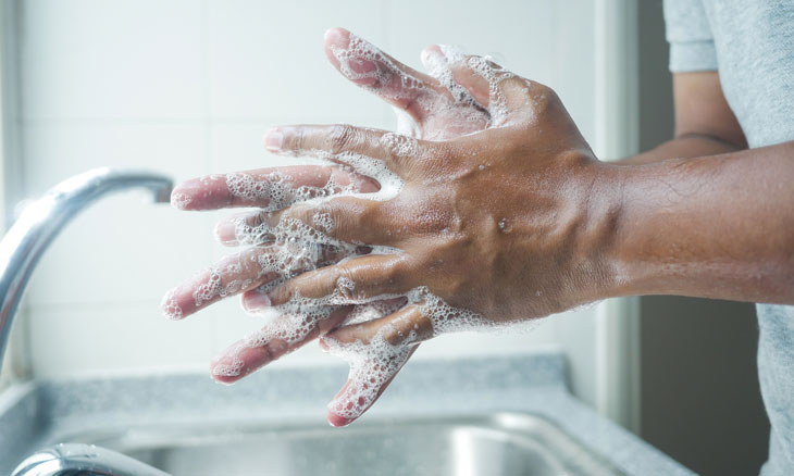 Man washing his hands