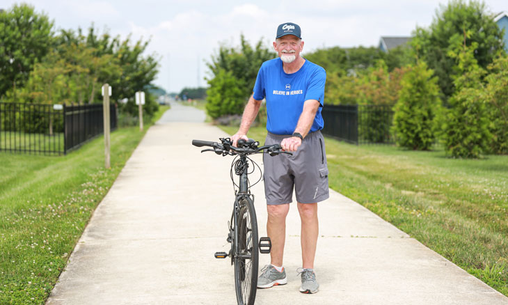 Michael Drulis prepares to ride his bike after recovery form his TVAR procedure.