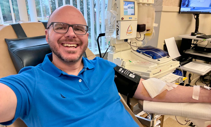 Bayhealth Oncology patient Jason Burlew donates blood.